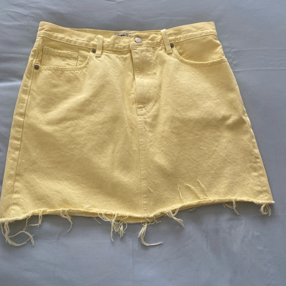 Pastel yellow Lucky Brand denim mini skirt.